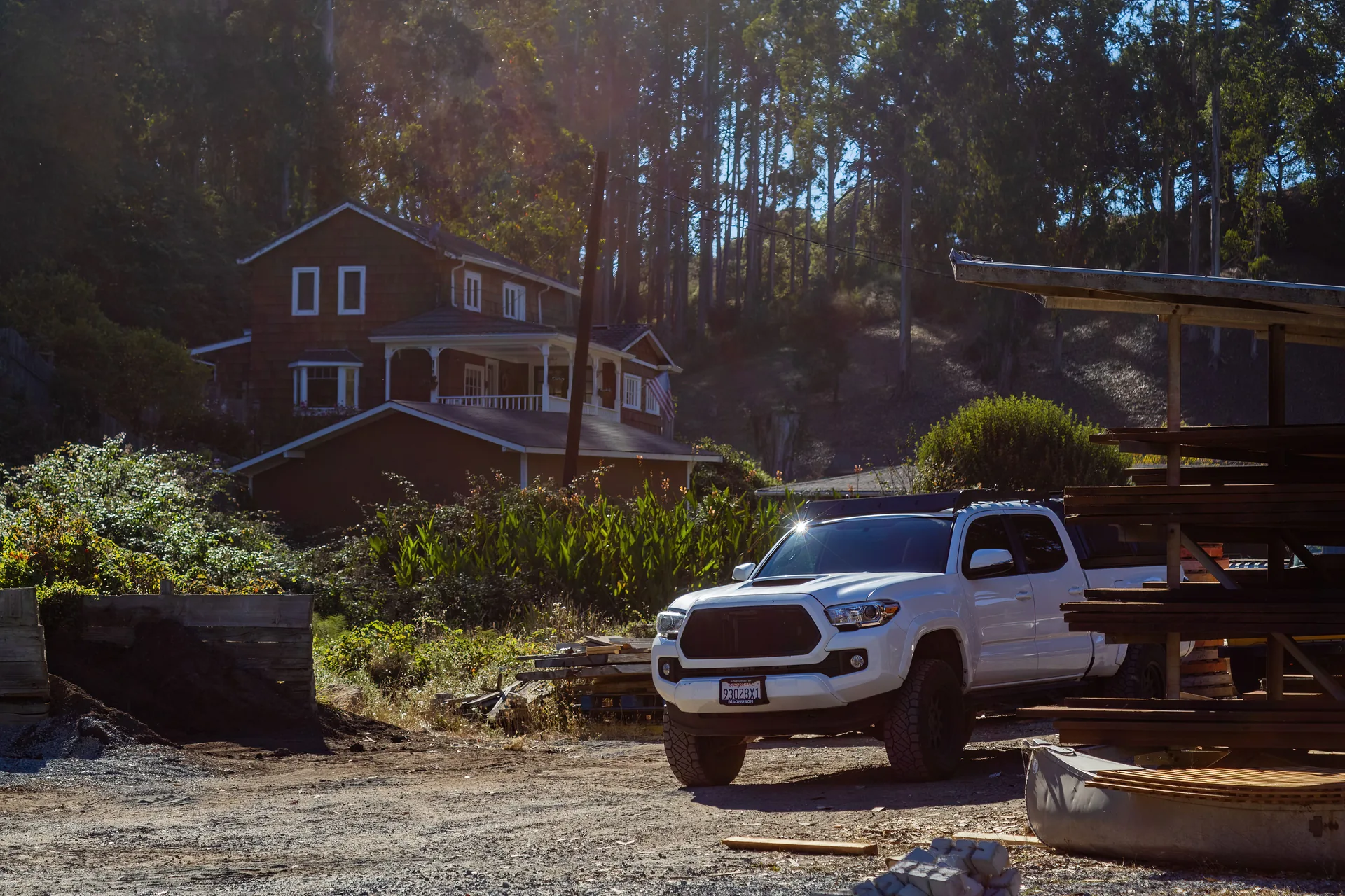 Work truck parked in a country driveway